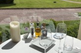 Manoir de la Poterie & Spa - Table du Restaurant avec vue sur le parc
